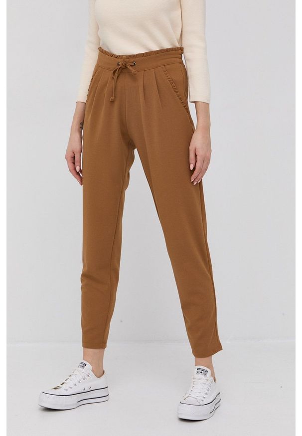 JDY Spodnie damskie kolor brązowy dopasowane medium waist. Stan: podwyższony. Kolor: brązowy. Materiał: dzianina