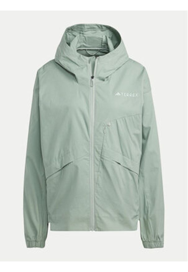 Adidas - adidas Wiatrówka Terrex Xploric IN4629 Zielony Loose Fit. Kolor: zielony. Materiał: bawełna