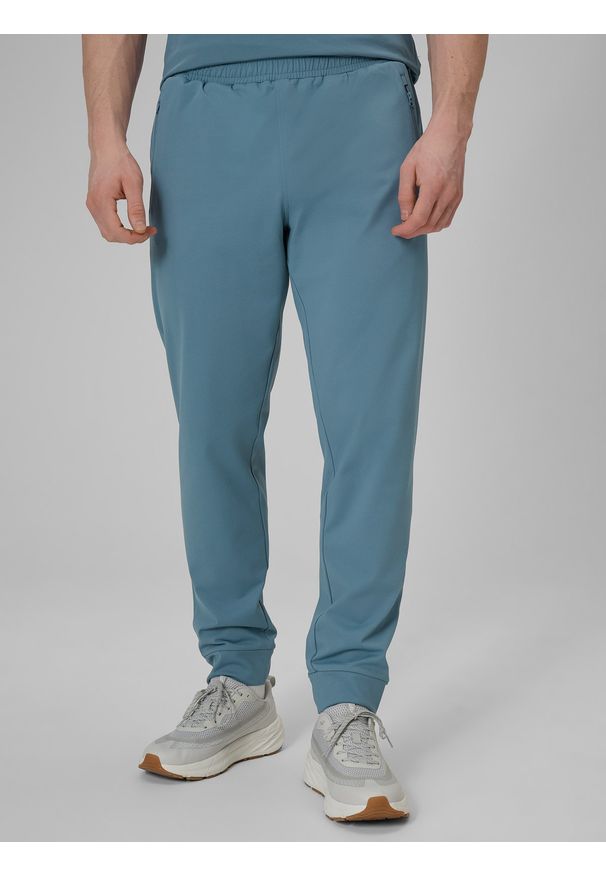 4f - 4F Spodnie treningowe szybkoschnące męskie - granatowe M. Kolor: niebieski. Sport: fitness