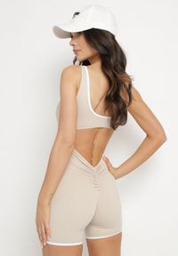 Born2be - Beżowy Kombinezon w Sportowym Stylu z Efektem Push Up i Ozdobną Lamówką Lunarella. Okazja: na co dzień. Kolor: beżowy. Materiał: jeans. Długość rękawa: na ramiączkach. Styl: sportowy #7