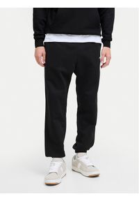 Jack & Jones - Jack&Jones Spodnie dresowe Kane Soho 12278943 Czarny Regular Fit. Kolor: czarny. Materiał: bawełna
