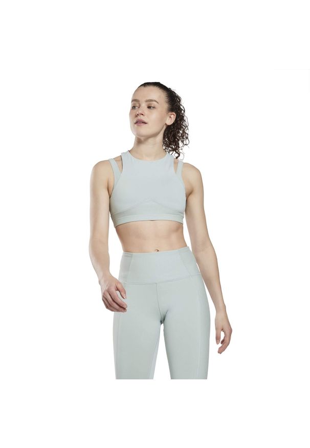 Biustonosz dla kobiet Reebok Studio. Kolor: niebieski. Sport: fitness