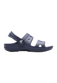 Sandały Crocs Classic Kids Sandal T Jr 207537-410 niebieskie niebieskie. Okazja: na spacer, na plażę, na uczelnię, na co dzień. Kolor: niebieski. Materiał: materiał. Styl: casual, klasyczny