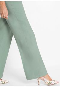 Spodnie z szerokimi nogawkami bonprix zielony pastelowy. Kolor: zielony #2