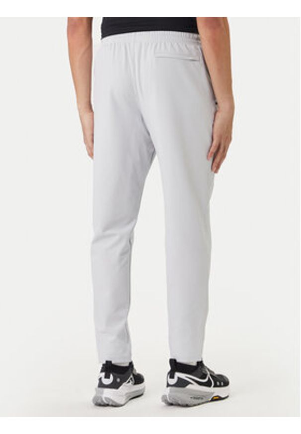 Under Armour Spodnie dresowe Unstoppable 6003861 Szary Loose Fit. Kolor: szary. Materiał: syntetyk