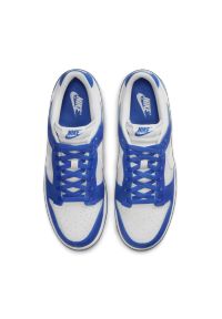 Nike Dunk Low Retro Sneakersy męskie. Okazja: na co dzień. Zapięcie: sznurówki. Kolor: biały. Materiał: guma, skóra. Szerokość cholewki: normalna. Wzór: gładki. Sezon: lato #2