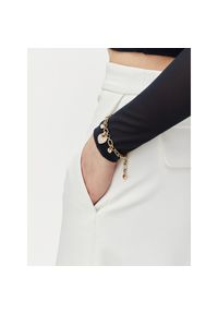 Bransoletka Guess. Materiał: złote. Kolor: złoty #1