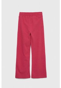 Fila spodnie dresowe dziecięce kolor różowy gładkie. Stan: podwyższony. Kolor: różowy. Materiał: dresówka. Wzór: gładki #3