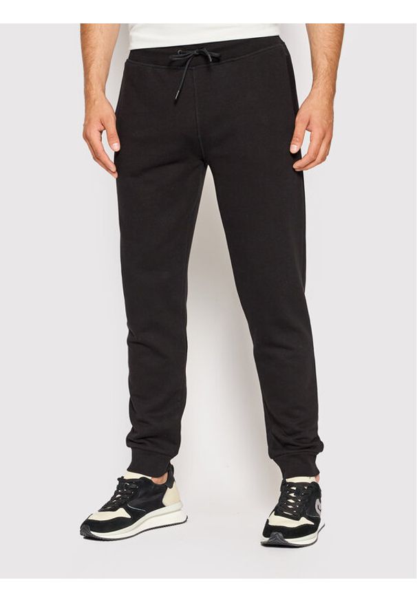 Guess Spodnie dresowe Z2YB22 KAIJ1 Czarny Regular Fit. Kolor: czarny. Materiał: bawełna