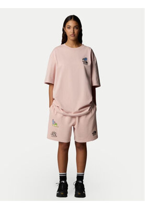 The North Face Szorty sportowe Unisex Mountain Cleanup NF0A8C2X Różowy Relaxed Fit. Kolor: różowy. Materiał: bawełna