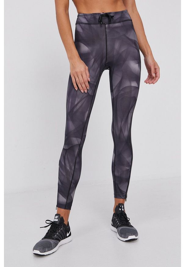 Nike Legginsy damskie kolor szary wzorzyste. Kolor: szary. Materiał: włókno, skóra, dzianina, tkanina, materiał. Technologia: Dri-Fit (Nike)