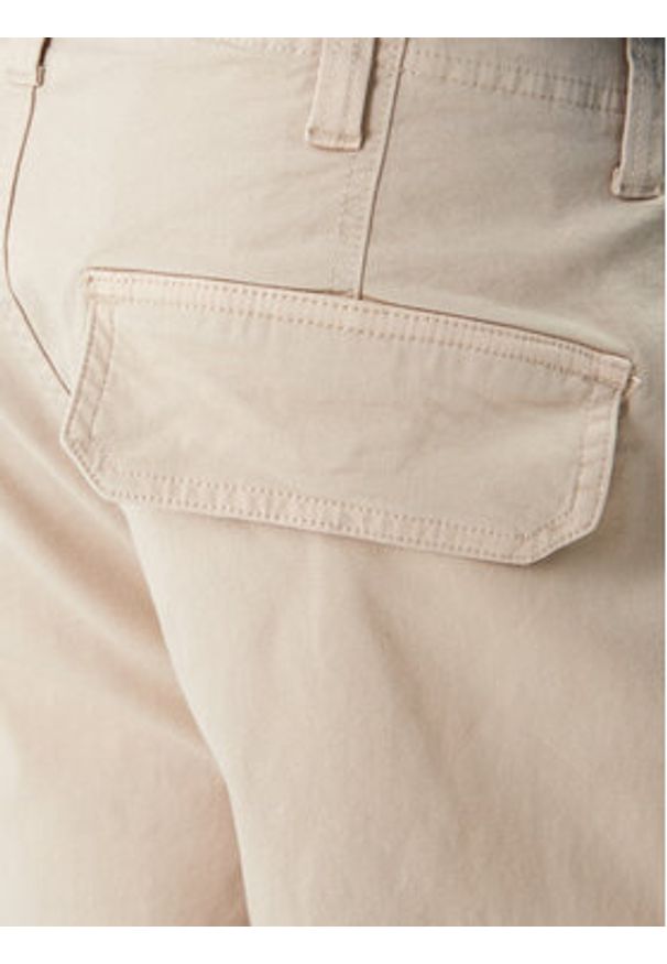 Tommy Jeans Spodnie materiałowe Sonny DM0DM22651 Beżowy Slim Fit. Kolor: beżowy. Materiał: bawełna