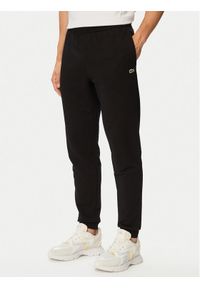Lacoste Spodnie dresowe XH9833 Czarny Regular Fit. Kolor: czarny. Materiał: bawełna #1