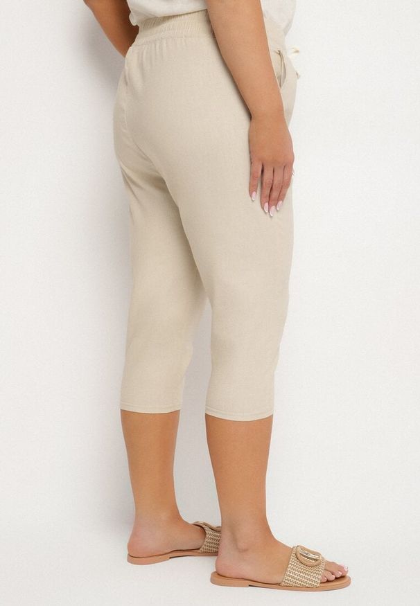 Born2be - Beżowe Spodnie z Bawełny z Wysokim Stanem i Wiązaniem Lirassia. Okazja: na co dzień. Stan: podwyższony. Kolor: beżowy. Materiał: bawełna. Styl: casual