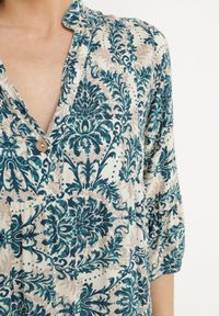 Born2be - Granatowo-Beżowa Rozkloszowana Sukienka z Bawełny z Falbanami w Ornamentalny Wzór Lanoreth. Okazja: na spacer, na co dzień. Typ kołnierza: dekolt w serek. Kolor: niebieski. Materiał: bawełna. Typ sukienki: rozkloszowane, proste. Styl: casual, klasyczny #7