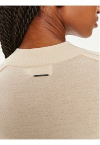 Calvin Klein Sweter K20K207206 Beżowy Regular Fit. Kolor: beżowy. Materiał: wełna