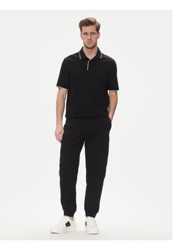 Armani Exchange Polo XM000739 AF10364 UC001 Czarny Regular Fit. Typ kołnierza: polo. Kolor: czarny. Materiał: bawełna
