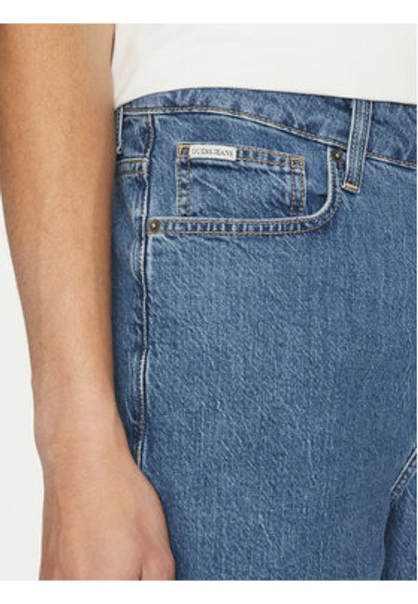 Guess Jeans Szorty jeansowe M4YD37 D5M54 Niebieski Regular Fit. Kolor: niebieski. Materiał: bawełna, jeans