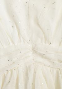 Renee - Jasnobeżowa Rozkloszowana Sukienka Mini z Metalicznym Nadrukiem i Falbankami Enrilea. Okazja: na imprezę. Typ kołnierza: kołnierz z falbankami. Kolor: beżowy. Wzór: nadruk. Długość: mini #4