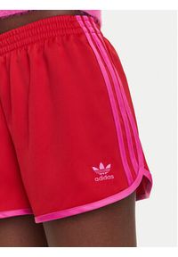 Adidas - adidas Szorty sportowe adicolor 3-Stripes Sprinter JZ3513 Czerwony Loose Fit. Kolor: czerwony. Materiał: syntetyk #5