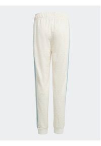Adidas - adidas Spodnie dresowe Monogram Print Tracksuit Bottoms IB8621 Biały Regular Fit. Kolor: biały. Materiał: syntetyk. Wzór: nadruk #5