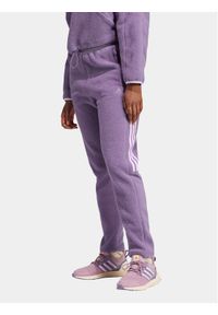 Adidas - Spodnie dresowe adidas. Kolor: fioletowy. Materiał: dresówka