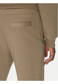 Hugo - HUGO Spodnie dresowe Dimacs 50533695 Brązowy Relaxed Fit. Kolor: brązowy. Materiał: bawełna