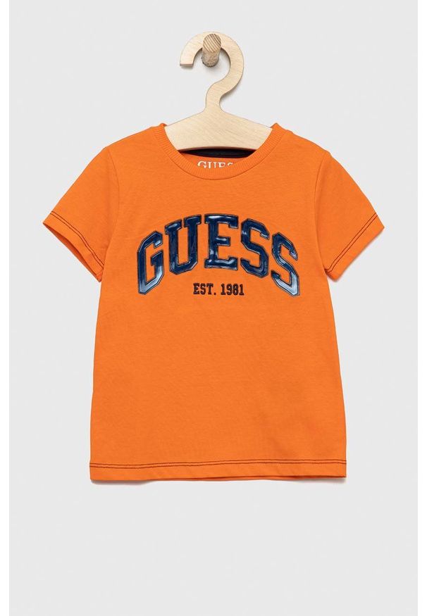 Guess t-shirt bawełniany dziecięcy kolor pomarańczowy wzorzysty. Okazja: na co dzień. Kolor: pomarańczowy. Materiał: bawełna. Wzór: haft. Styl: casual