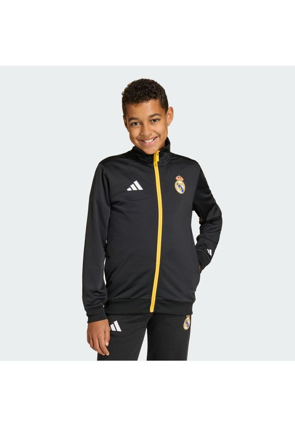 Adidas - Bluza dresowa adidas Real Madrid Avengers Kids. Kolor: czarny. Materiał: dresówka. Wzór: motyw z bajki. Sport: piłka nożna