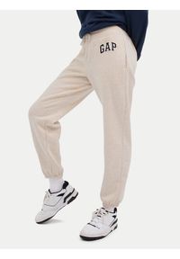 GAP - Gap Spodnie dresowe 463492-12 Beżowy Regular Fit. Kolor: beżowy. Materiał: bawełna #1