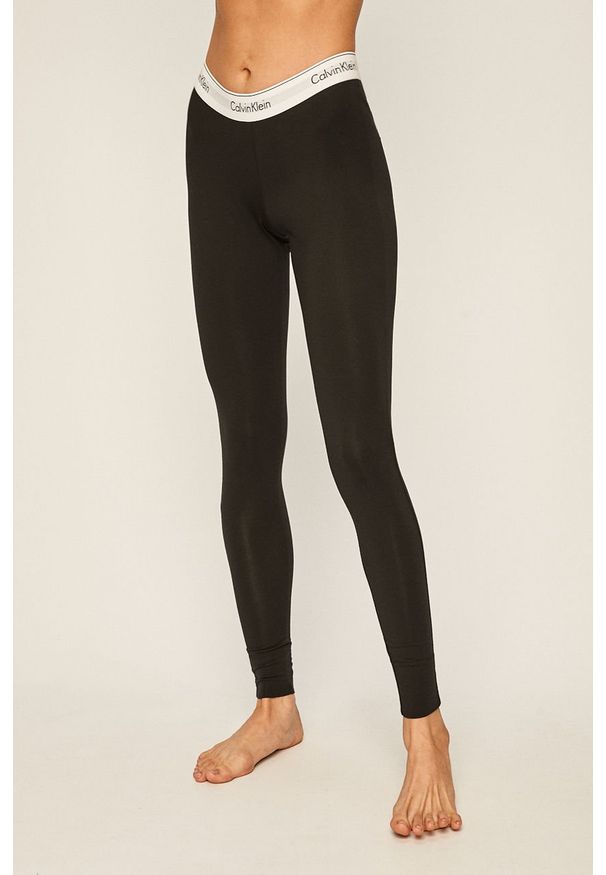 Calvin Klein Underwear - Legginsy piżamowe. Kolor: czarny. Materiał: bawełna, materiał, dzianina, elastan, nylon, poliester. Wzór: gładki