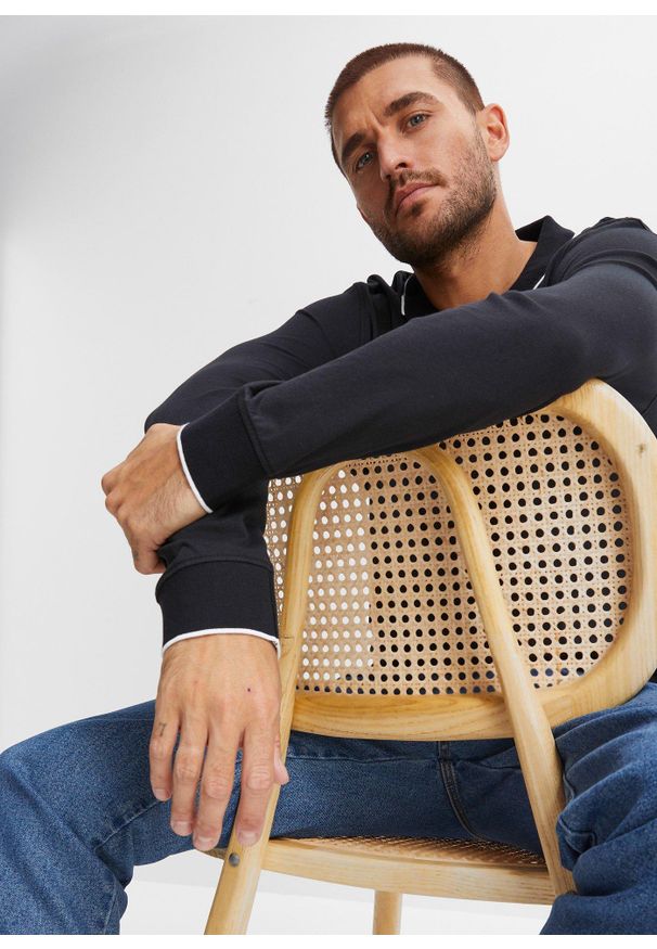 bonprix - Koszulka polo z czystej bawełny organicznej, nadającej się do recyklingu. Typ kołnierza: polo. Kolor: czarny. Materiał: bawełna. Długość rękawa: długi rękaw. Długość: długie