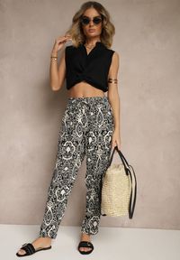 Renee - Czarne Wiskozowe Spodnie High Waist Zdobione Ornamentalnym Printem Jenavitha. Stan: podwyższony. Kolor: czarny. Materiał: wiskoza. Wzór: aplikacja, nadruk. Sezon: lato, wiosna. Styl: klasyczny, elegancki