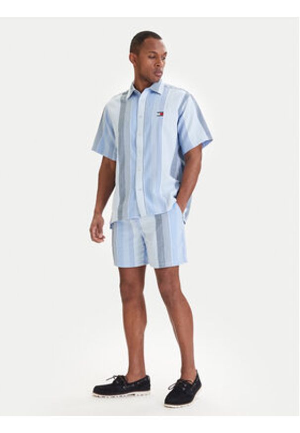 Tommy Jeans Szorty materiałowe Dobby Stripe DM0DM22830 Błękitny Relaxed Fit. Kolor: niebieski. Materiał: bawełna