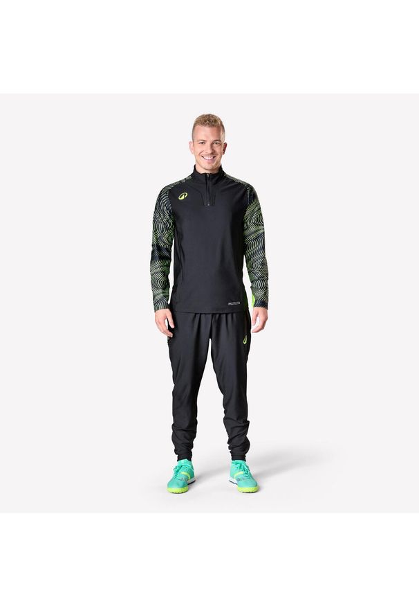 KIPSTA - Bluza piłkarska Kipsta Viralto Wave na krótki suwak. Kolor: czarny. Materiał: materiał, poliester, elastan. Długość: krótkie. Sport: piłka nożna