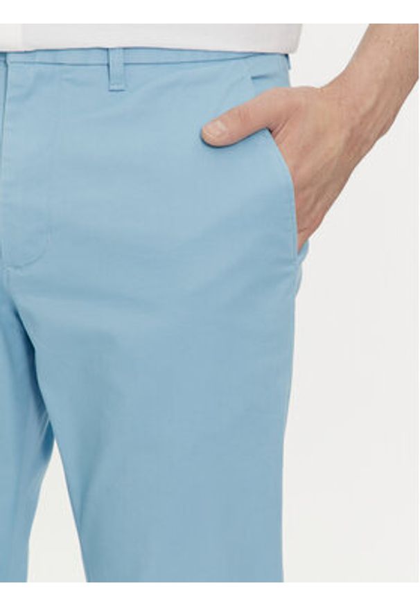 TOMMY HILFIGER - Tommy Hilfiger Chinosy Bleecker MW0MW26619 Błękitny Slim Fit. Kolor: niebieski. Materiał: bawełna