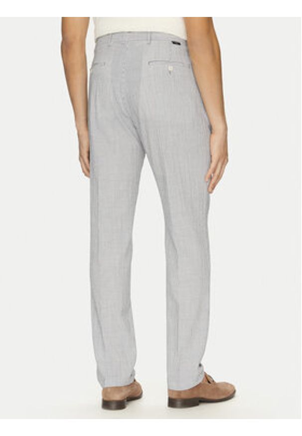 Marciano Guess Chinosy 5GHB17 2314Z Błękitny Slim Fit. Kolor: niebieski. Materiał: len, lyocell