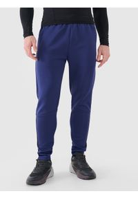 4f - 4F Spodnie treningowe szybkoschnące męskie - granatowe XL. Kolor: niebieski. Materiał: dzianina, dresówka, włókno, syntetyk, materiał, elastan. Wzór: ze splotem, jednolity. Sport: fitness