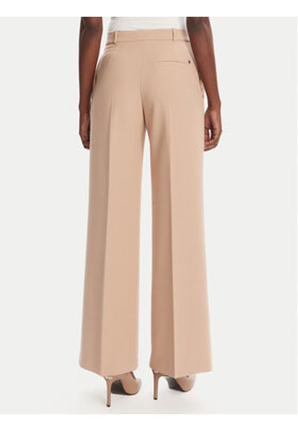 Hugo - HUGO Spodnie palazzo Hasmina 50545533 Beżowy Regular Fit. Kolor: beżowy. Materiał: syntetyk