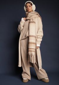 Renee - Beżowy Nierozpinany Casualowy Kardigan o Długim Kroju Ozdobiony Ściągaczami Arfilia. Okazja: na co dzień. Kolor: beżowy. Materiał: jeans. Długość: długie. Wzór: aplikacja. Styl: casual