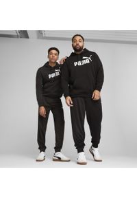 Puma - Męskie spodnie poliestrowe Essentials z logo No. 1 PUMA Black. Kolor: czarny. Materiał: poliester. Wzór: nadruk. Sport: turystyka piesza