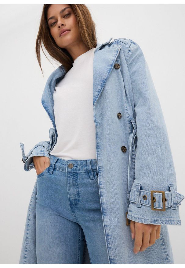 bonprix - Jeansy z rozkloszowanymi nogawkami, mid waist, ze stretchem. Kolor: niebieski