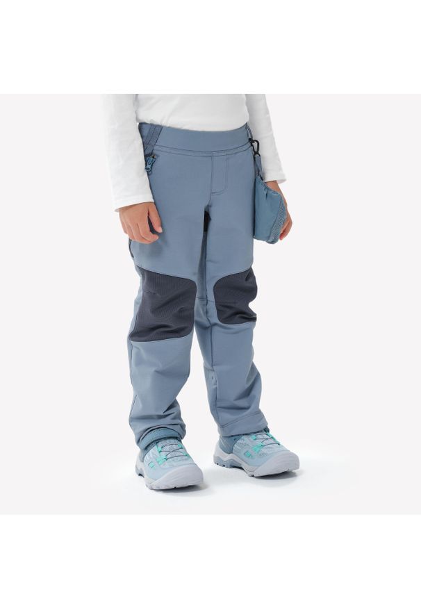 quechua - Spodnie softshell turystyczne dla dzieci Quechua MH900. Kolor: wielokolorowy, niebieski, szary. Materiał: softshell. Sezon: lato. Sport: turystyka piesza