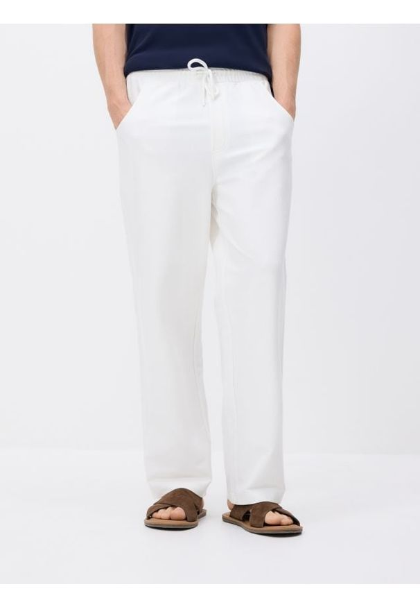 Reserved - Spodnie wide leg z wiązaniem - złamana biel. Materiał: bawełna, dzianina