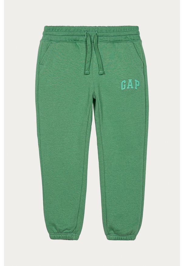 GAP - Spodnie dziecięce 104-176 cm. Kolor: zielony. Materiał: bawełna, poliester, dzianina. Wzór: gładki