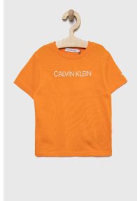 Calvin Klein Jeans t-shirt bawełniany dziecięcy kolor pomarańczowy z nadrukiem. Kolor: pomarańczowy. Materiał: bawełna. Wzór: nadruk #1