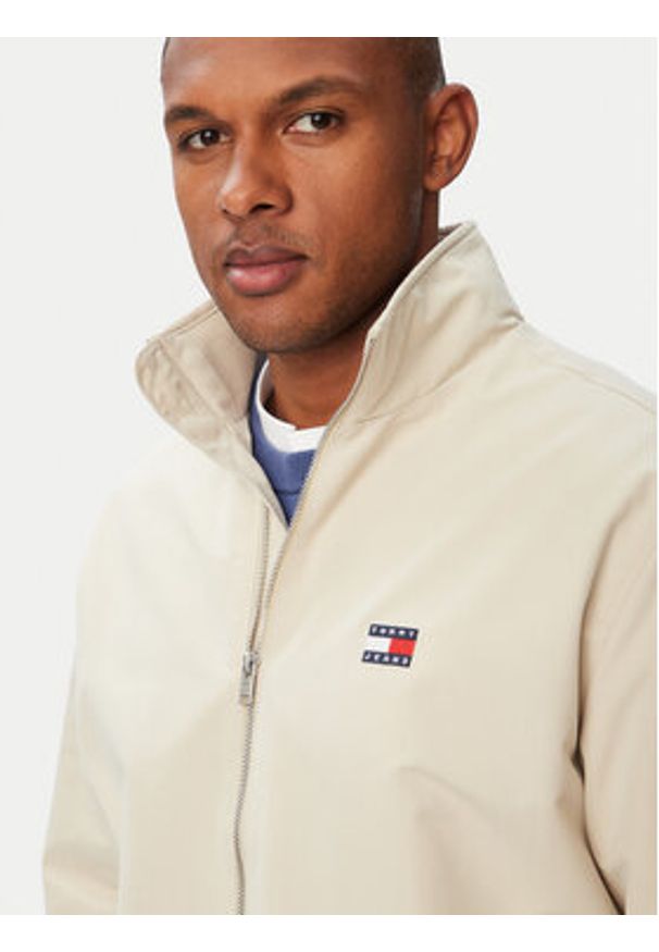 Tommy Jeans Kurtka przejściowa Essential DM0DM22720 Beżowy Regular Fit. Kolor: beżowy. Materiał: syntetyk