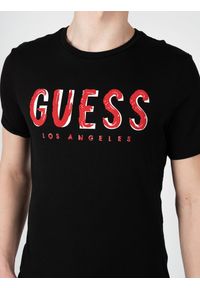 Guess T-Shirty "Malco" | X2RI05KAK91 | Mężczyzna | Czarny. Kolor: czarny. Materiał: bawełna. Wzór: nadruk. Styl: klasyczny #5