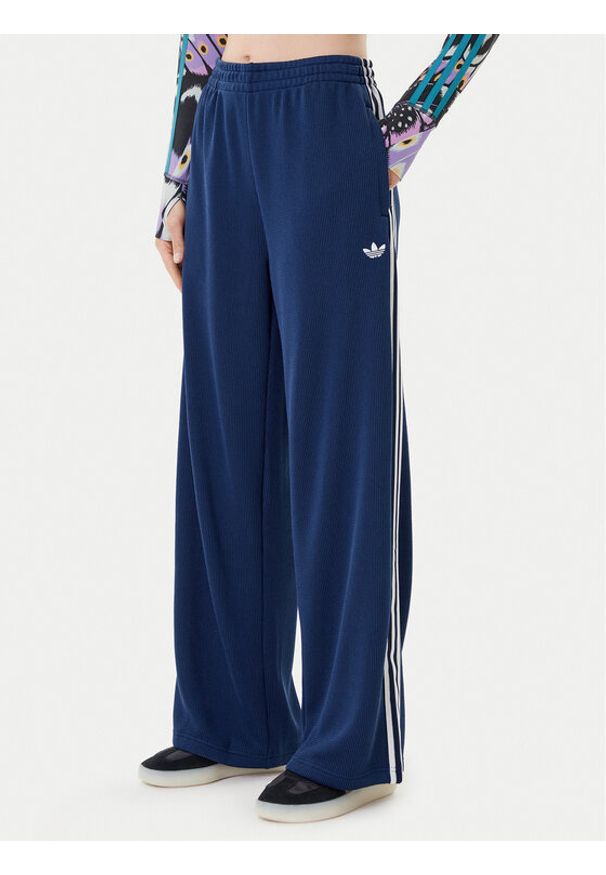 Adidas - adidas Spodnie dresowe adicolor Firebird JV7524 Granatowy Regular Fit. Kolor: niebieski. Materiał: syntetyk