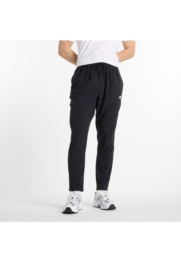 Spodnie męskie New Balance MP51904BK – czarne. Kolor: czarny. Materiał: poliester. Sport: fitness